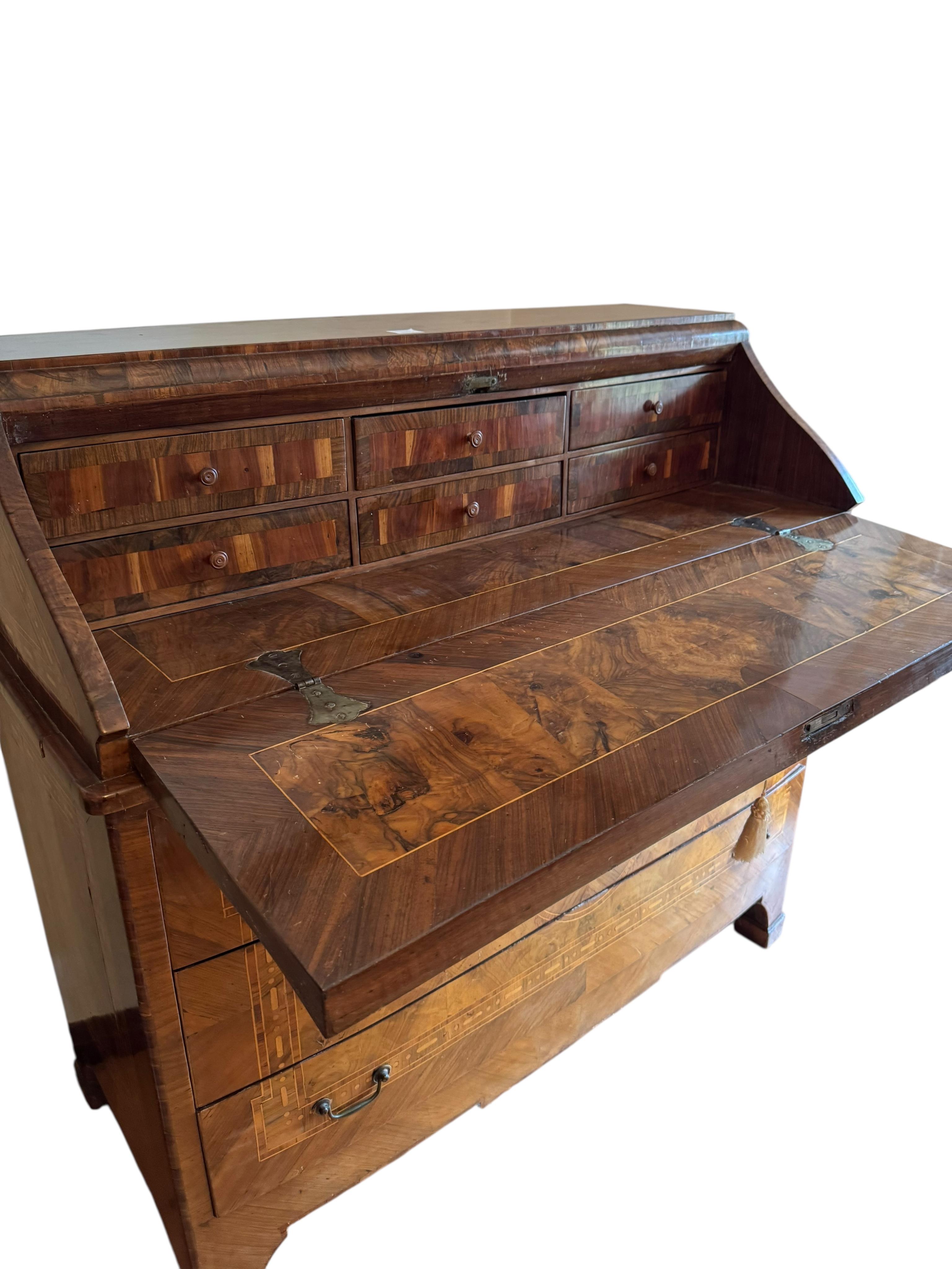 An 18th century Italian inlaid walnut bureau, width 124cm, depth 54cm, height 116cm